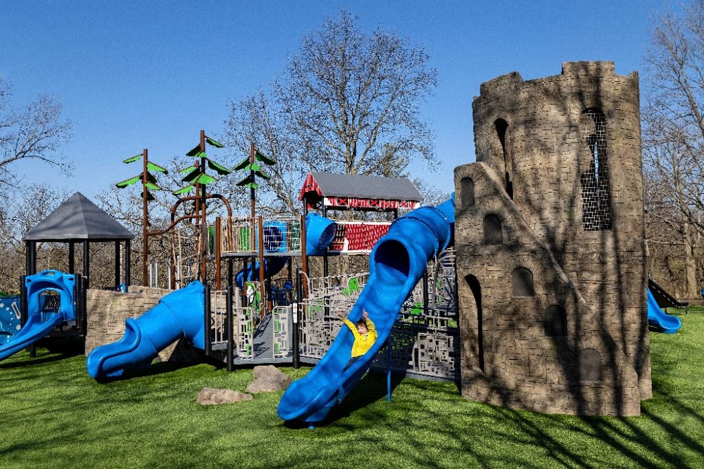 Covered bridges and a replica of Clark Tower make this playground a community landmark